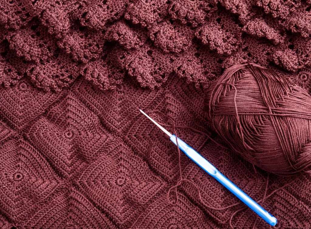 Hook inserting under vertical bar of chain stitch